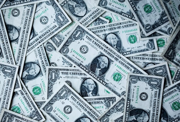 pile-of-dollar-bills-money